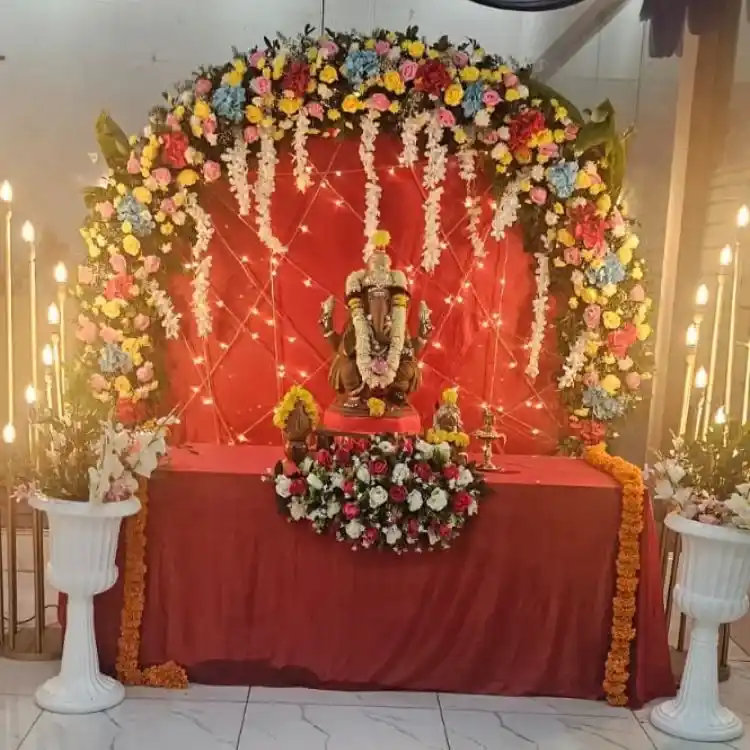 Ganesh Chaturthi mandap decoration with artificial flowers